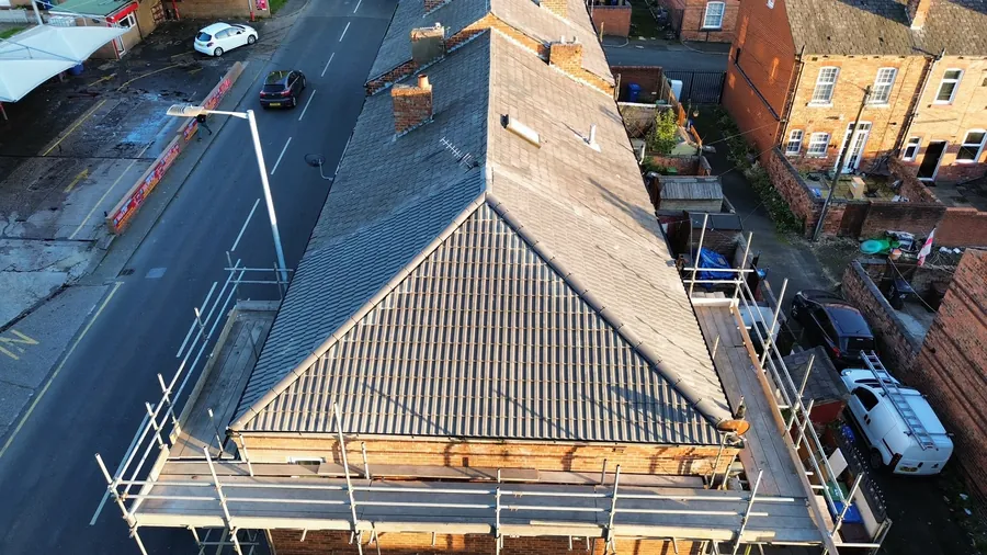 New hip roof on a corner terrace seen from above