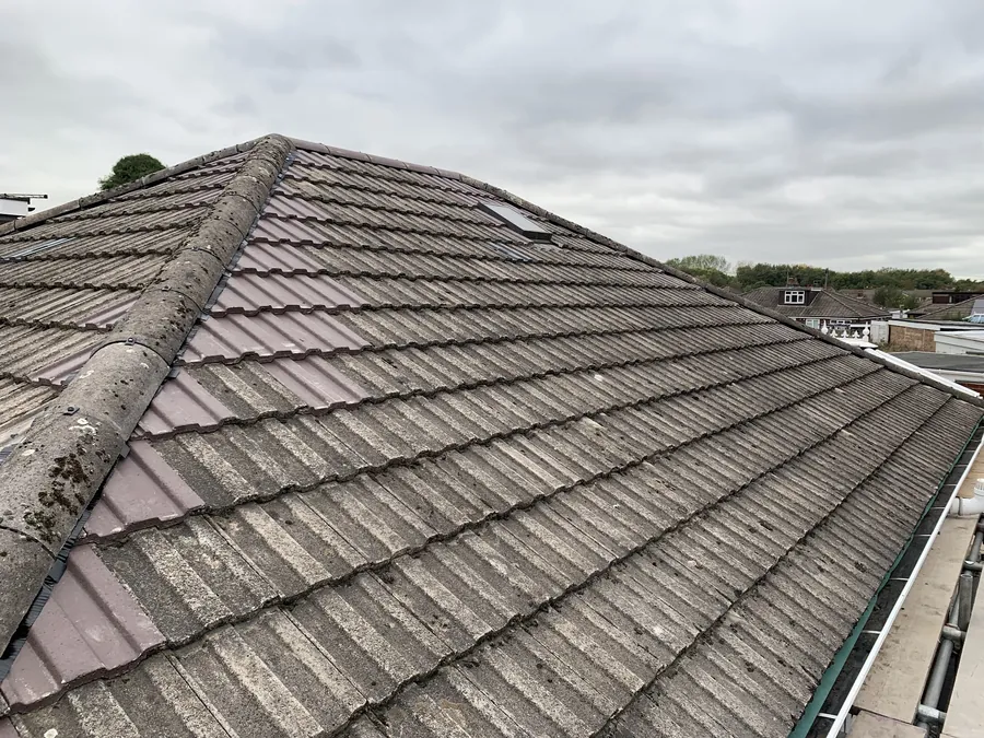 Old concrete tile roof before replacement