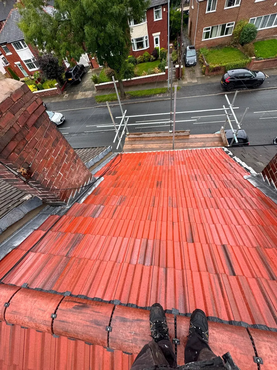 Red tile roof from the ridge with the street below