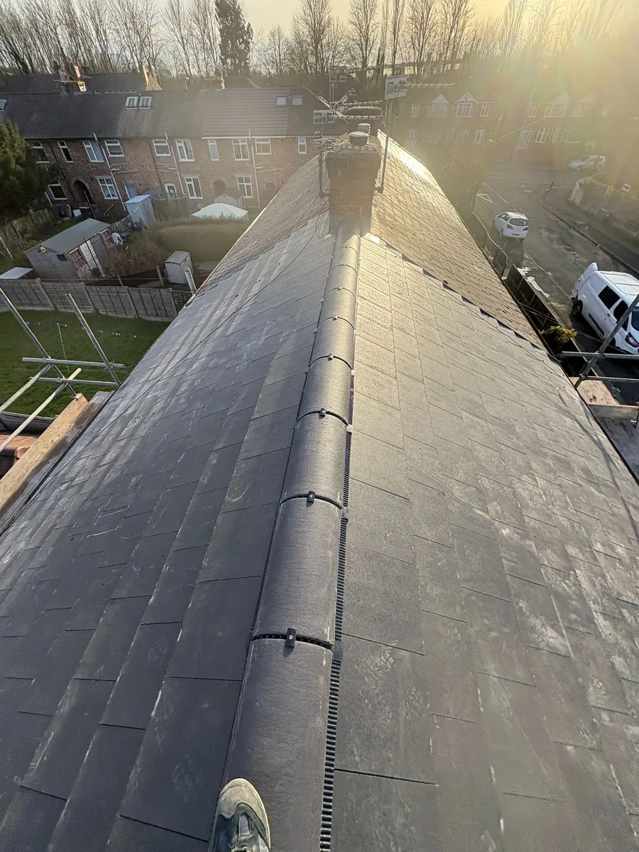 Long ridge on a new slate-effect roof